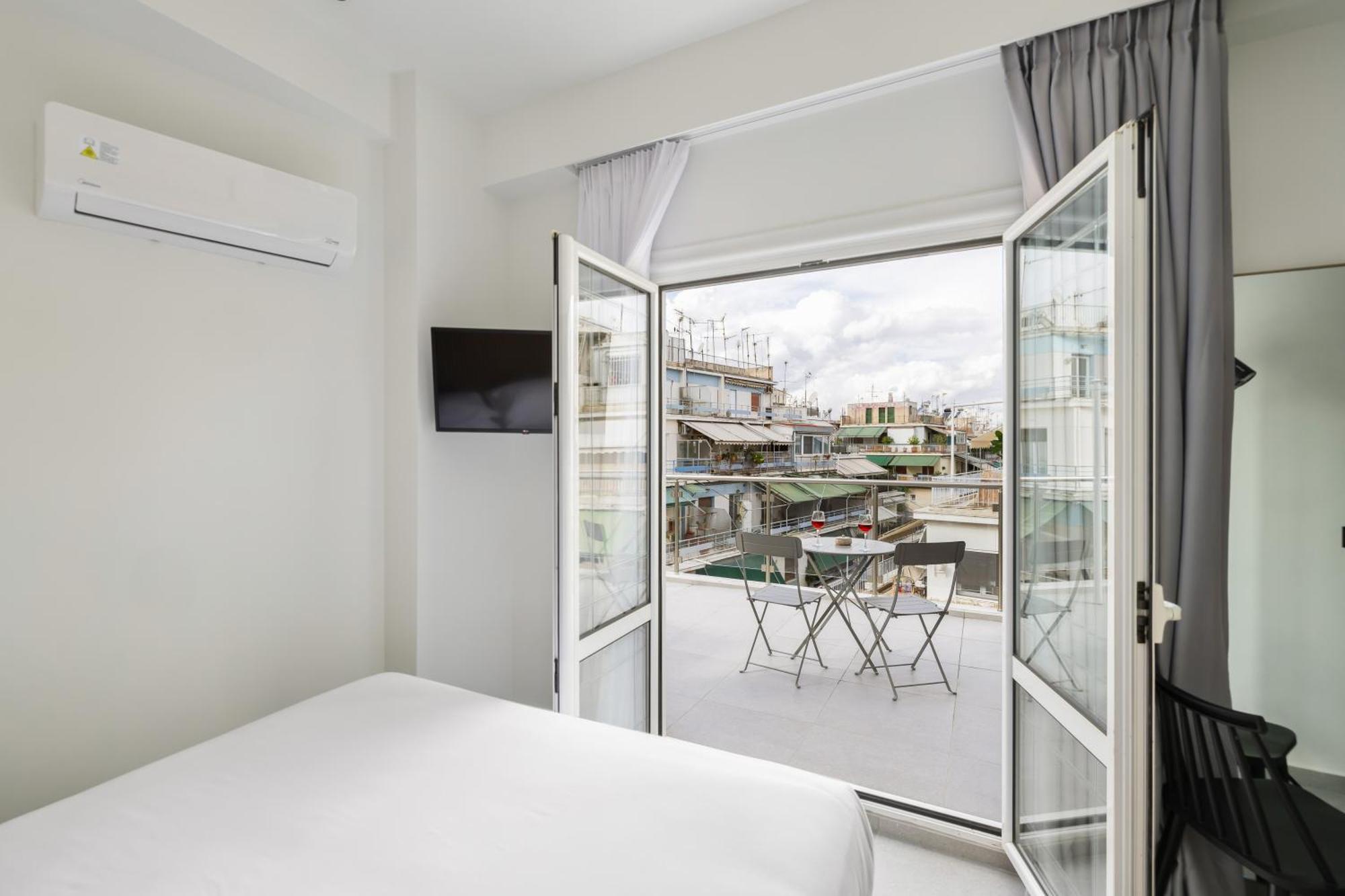 The Q Hotel Atene Esterno foto