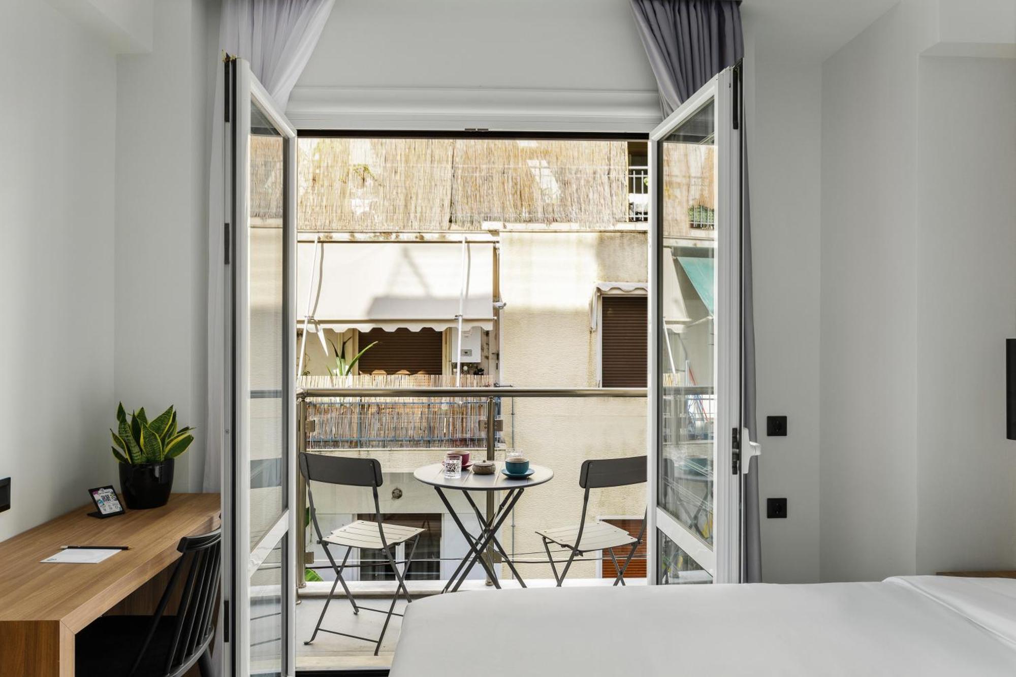 The Q Hotel Atene Esterno foto